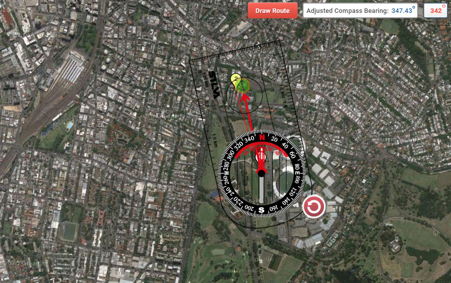 Red compass direction of travel arrow and compass bearing display adjusted to compensate for magnetic declination. The map or true bearing display appears in the upper right corner (342º in this example)